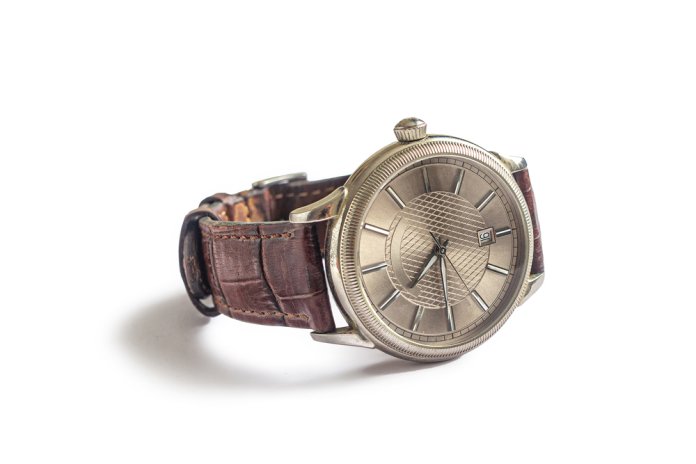 An,Old,Wrist,Watch,With,A,Round,Dial,And,An